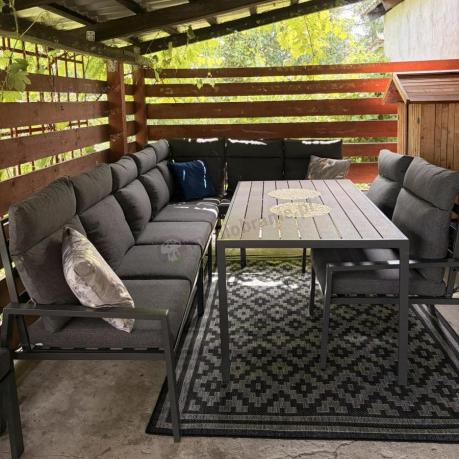 Duży narożnik ogrodowy metalowy 294x184cm Doros Corner XXL z 2 fotelami, 2 pufami i stołem 160cm - Polywood Dark Grey