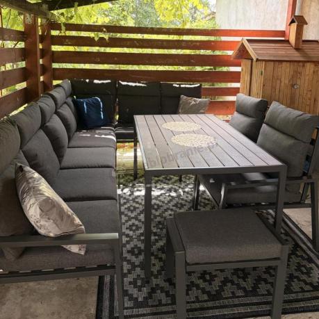 Duży narożnik ogrodowy metalowy 294x184cm Doros Corner XXL z 2 fotelami, 2 pufami i stołem 160cm - Polywood Dark Grey