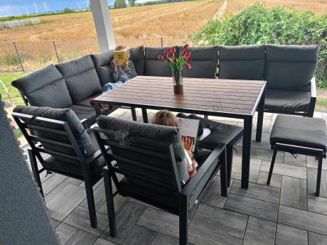 Duży narożnik ogrodowy metalowy 294x184cm Doros Corner XXL z 2 fotelami, 2 pufami i stołem 160cm - Polywood Dark Grey