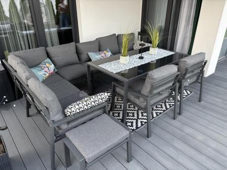 Duży narożnik ogrodowy metalowy 294x184cm Sodor Corner XXL z 2 fotelami, 2 pufami i stołem 160cm - Dark Grey