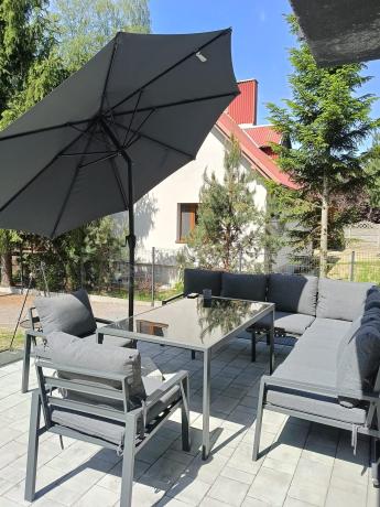 Duży narożnik ogrodowy metalowy 294x184cm Sodor Corner XXL z 2 fotelami, 2 pufami i stołem 160cm - Dark Grey
