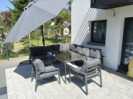 Duży narożnik ogrodowy metalowy 294x184cm Sodor Corner XXL z 2 fotelami, 2 pufami i stołem 160cm - Dark Grey