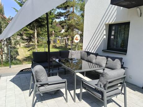 Duży narożnik ogrodowy metalowy 294x184cm Sodor Corner XXL z 2 fotelami, 2 pufami i stołem 160cm - Dark Grey