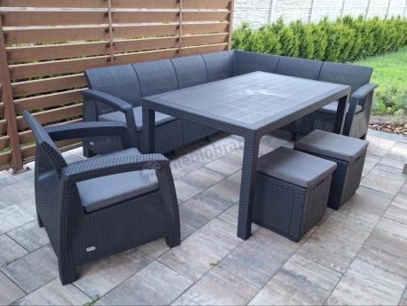 Duży narożnik ogrodowy ze stołem obiadowym Rellme VI z fotelem i pufami grafitowy