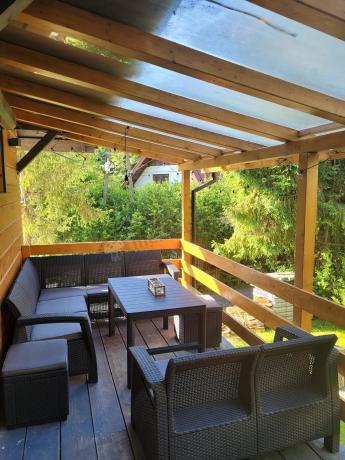 Duży narożnik Relly VI grafit z podnoszonym stołem i fotelem + pufy