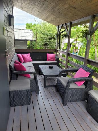 Duży narożnik Relly VI grafit z podnoszonym stołem i fotelem + pufy