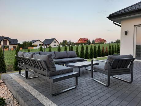 Duży nowoczesny narożnik na taras z fotelem Panaon DG