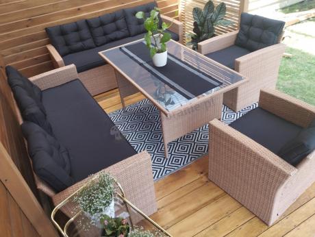 Duży zestaw ogrodowy z czarnymi poduszkami