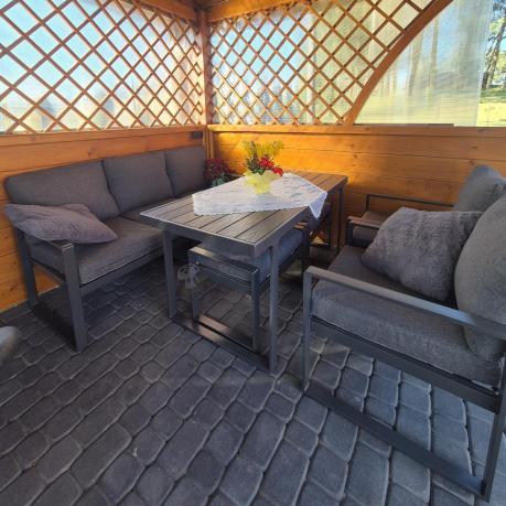 Grafitowe meble do ogrodu dla 7 osób - sofa 175cm, 2 fotele i 2 pufy - Panaon Dining DG