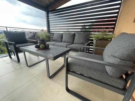 Grafitowe meble metalowe na taras z sofą i fotelami - Panaon Dining DG