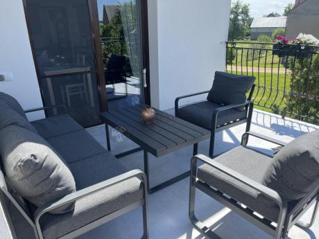 Grafitowe meble metalowe na taras z sofą i fotelami - Panaon Dining DG