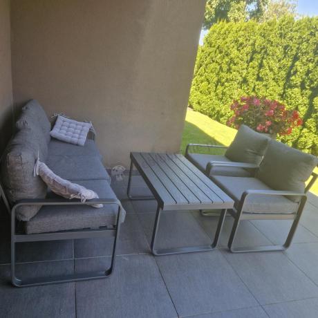 Grafitowe meble metalowe na taras z sofą i fotelami - Panaon Dining DG