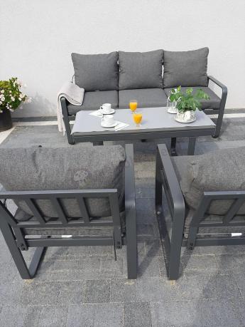 Grafitowe meble metalowe na taras z sofą i fotelami - Panaon Dining DG