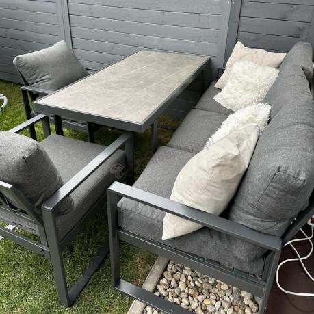 Grafitowe meble na taras dla 5 osób ze stolikiem ze szklanym blatem- Panaon Dining Elite DG