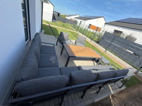 Grafitowe nowoczesne meble tarasowe dla 11 osób Sodor Corner XXL narożnik z 2 fotelami i 2 pufami - Dark Grey Polywoo