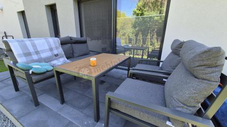 Grafitowy komplet mebli metalowych do ogrodu z sofą 175cm Doros Dining Polywood