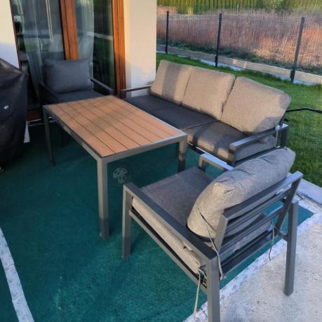 Grafitowy komplet ogrodowy metalowy z sofą 175 cm i stołem polywood Sodor Dining