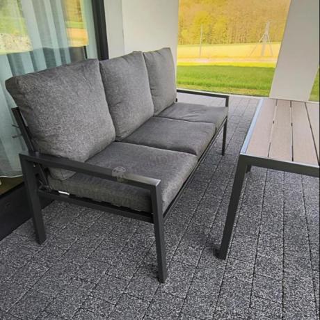 Grafitowy komplet ogrodowy metalowy z sofą 175 cm i stołem polywood Sodor Dining