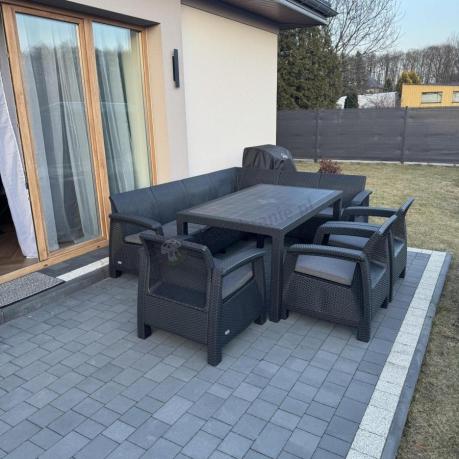 Grafitowy narożnik na taras ze stołem obiadowym Rellme VI i 3 fotelami