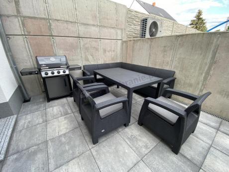 Grafitowy narożnik na taras ze stołem obiadowym Rellme VI i 3 fotelami