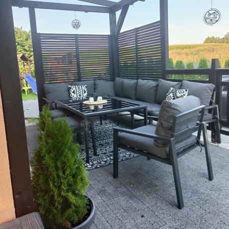 Grafitowy narożnik ogrodowy 184x294cm modułowy ze stołem obiadowym i fotelem Sodor Corner XXL - Dark Grey