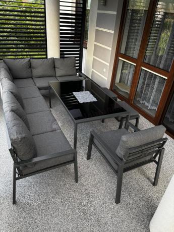 Grafitowy narożnik ogrodowy 184x294cm modułowy ze stołem obiadowym i fotelem Sodor Corner XXL - Dark Grey