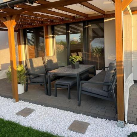 Grafitowy zestaw aluminiowych mebli na taras dla 7 osób ze stołem ceramic glass - Tavaro Dining Antracite