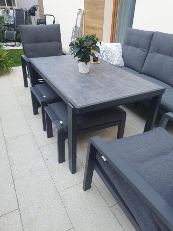 Grafitowy zestaw aluminiowych mebli na taras dla 7 osób ze stołem ceramic glass - Tavaro Dining Antracite