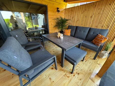 Grafitowy zestaw aluminiowych mebli na taras dla 7 osób ze stołem ceramic glass - Tavaro Dining Antracite