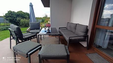 Grafitowy zestaw mebli metalowych na taras Sodor Dining + pufy - Dark Grey