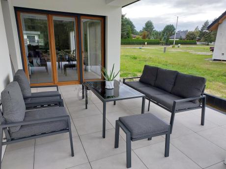 Grafitowy zestaw mebli metalowych na taras Sodor Dining + pufy - Dark Grey