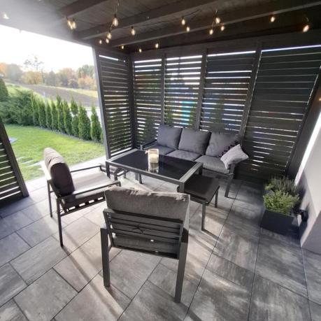 Grafitowy zestaw mebli metalowych na taras Sodor Dining + pufy - Dark Grey