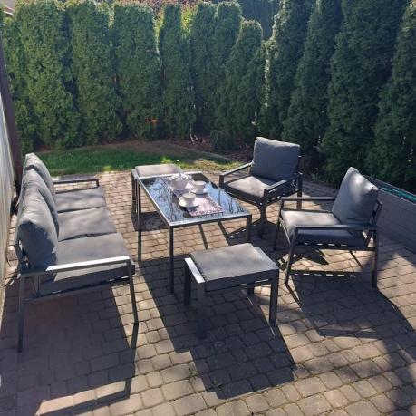 Grafitowy zestaw mebli metalowych na taras Sodor Dining + pufy - Dark Grey