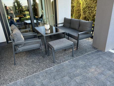 Grafitowy zestaw mebli metalowych na taras Sodor Dining + pufy - Dark Grey