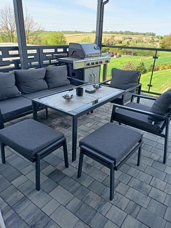 Grafitowy zestaw mebli metalowych na taras Sodor Dining + pufy - Dark Grey