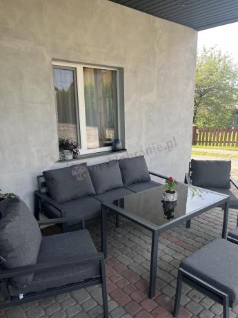 Grafitowy zestaw mebli metalowych na taras Sodor Dining + pufy - Dark Grey