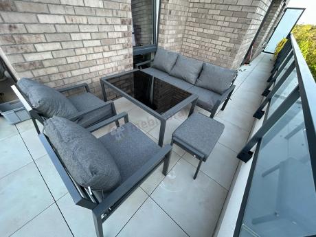 Grafitowy zestaw mebli metalowych na taras Sodor Dining + pufy - Dark Grey