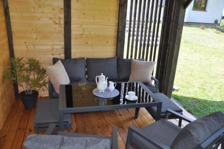 Grafitowy zestaw mebli metalowych na taras Sodor Dining + pufy - Dark Grey