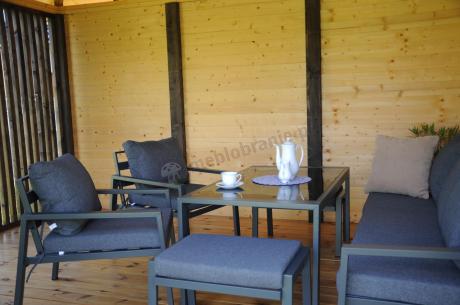 Grafitowy zestaw mebli metalowych na taras Sodor Dining + pufy - Dark Grey