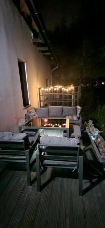 Grafitowy zestaw mebli metalowych na taras Sodor Dining + pufy - Dark Grey