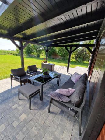 Grafitowy zestaw mebli metalowych na taras Sodor Dining + pufy - Dark Grey