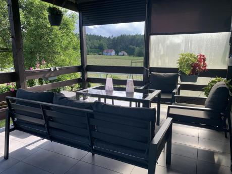 Grafitowy zestaw mebli metalowych na taras Sodor Dining + pufy - Dark Grey