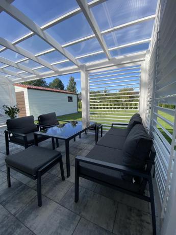 Grafitowy zestaw mebli metalowych na taras Sodor Dining + pufy - Dark Grey