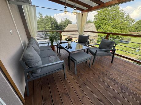 Grafitowy zestaw mebli metalowych na taras Sodor Dining + pufy - Dark Grey