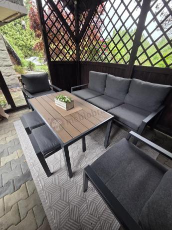 Grafitowy zestaw mebli metalowych na taras Sodor Dining + pufy - Dark Grey Polywood