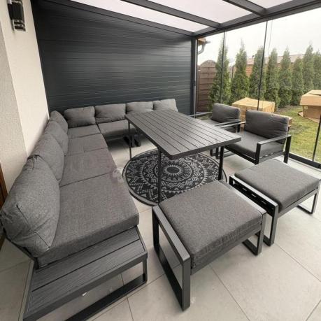 Grafitowy zestaw mebli na taras - narożnik modułowy, wysoki stół, fotele i pufy - Panaon Corner XXL - DG