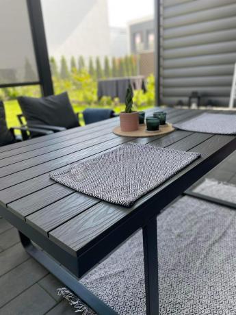 Grafitowy zestaw mebli na taras - narożnik modułowy, wysoki stół, fotele i pufy - Panaon Corner XXL - DG