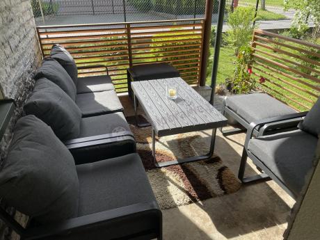 Grafitowy zestaw mebli na taras - sofa 175cm, 2 fotele i 2 pufy - Panaon Dining DG