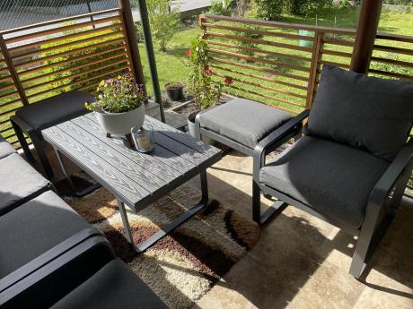 Grafitowy zestaw mebli na taras - sofa 175cm, 2 fotele i 2 pufy - Panaon Dining DG