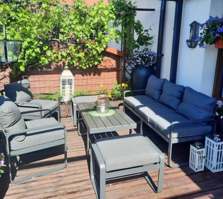 Grafitowy zestaw mebli na taras - sofa 175cm, 2 fotele i 2 pufy - Panaon Dining DG